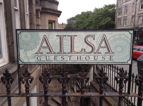a street sign on the side of a building at Ailsa Guest House in Edinburgh