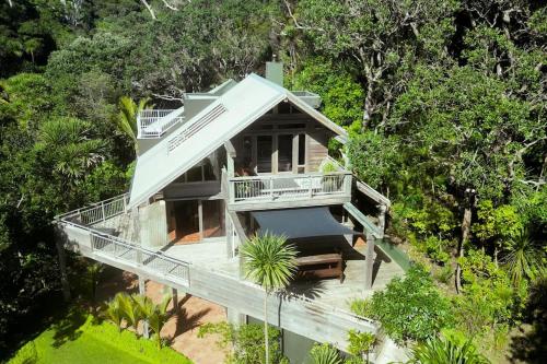 an overhead view of a house in the forest at Whananaki Hideaway 