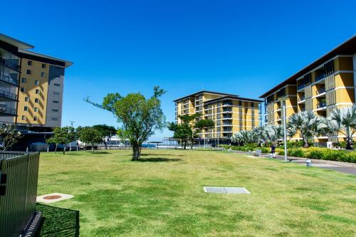 a park in the middle of a city with buildings at Serenity Deja Blue - at Darwin Waterfront in Darwin