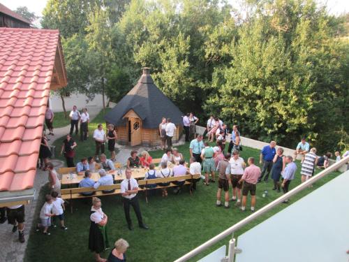 a group of people standing in front of a gazebo at Hotel Dirsch Wellness & Spa Resort in Emsing