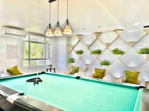 a billiard room with a pool table at Nordic 1BR in Twin Lakes Tagaytay LL3-G in Tagaytay