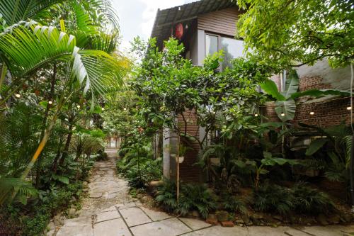 a garden in front of a house at King Kong Homestay in Ninh Binh
