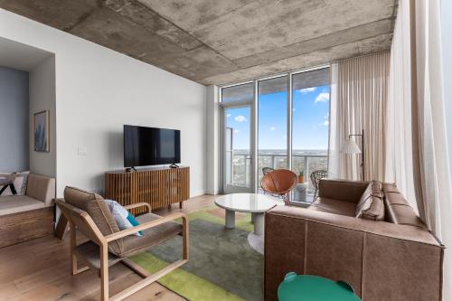 TV a/nebo společenská místnost v ubytování Austin Condo Hotel