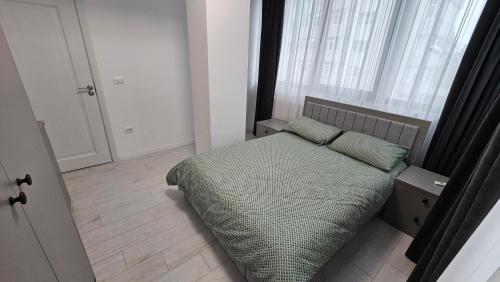 Postel nebo postele na pokoji v ubytování Nordic Residence 31