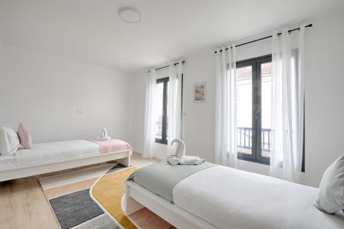 Krevet ili kreveti u jedinici u objektu Maison Créteil - Maison climatisée avec jardin