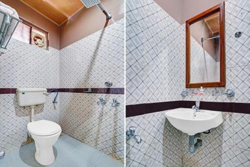 a bathroom with a toilet and a sink at Palette - Pagoda Resorts in Cochin