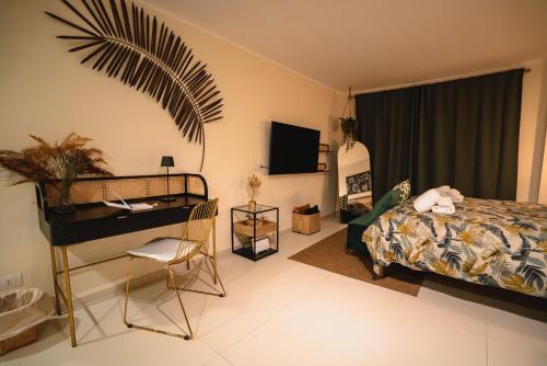 Ένα ή περισσότερα κρεβάτια σε δωμάτιο στο Vinto House Salerno Downtown