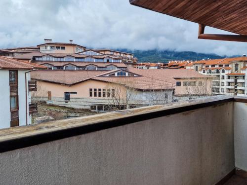 a view of a city from a balcony at Cedar Lodge 2 Bedroom Apartment by Flat Mаnager in Bansko