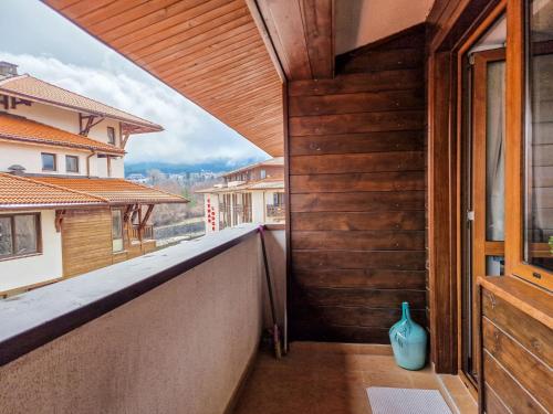 a view from the balcony of a house at Cedar Lodge 2 Bedroom Apartment by Flat Mаnager in Bansko