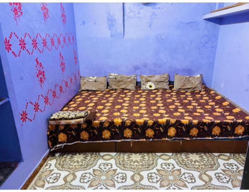 Tempat tidur dalam kamar di Hotel Uma Shree, Ujjain