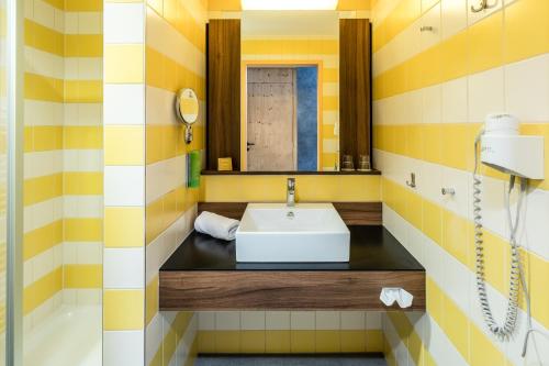 Kúpeľňa v ubytovaní JUFA Hotel Wipptal