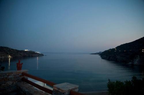 a view of a large body of water at night at Ammos 2 - Seafront maisonette, Glyfo beach, Sifnos in Chrisopigi
