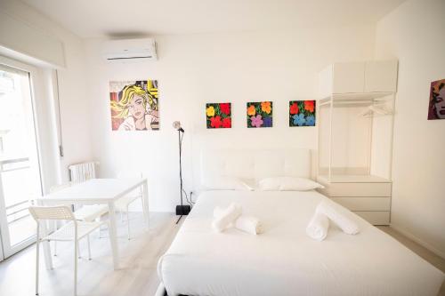 Giường trong phòng chung tại Nuovissimo Loft in Zona Corvetto (M3)