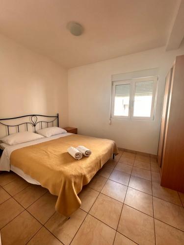 Katil atau katil-katil dalam bilik di Perica Apartments