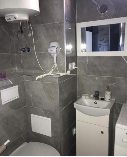 Um banheiro em Apartament Mariacka - centrum