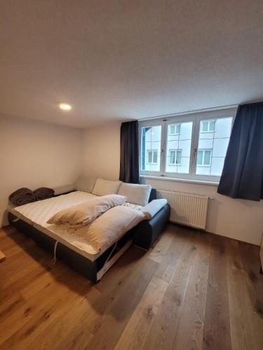 Postel nebo postele na pokoji v ubytování Waibel Appartement Bezau