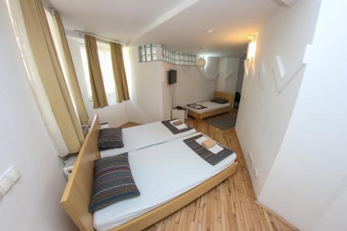 Postel nebo postele na pokoji v ubytování Hotel Hayat