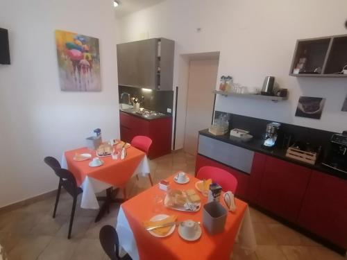 Kuchyň nebo kuchyňský kout v ubytování Hotel Centrale