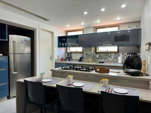 Una cocina o cocineta en Cobertura com jacuzzi no Centro