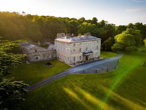 an aerial view of a large building in a field at Victorian Copper Cottage in Lancaster