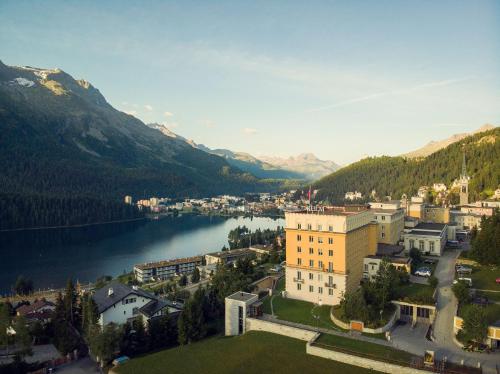 an aerial view of a town next to a lake at Kulm Hotel St. Moritz in St. Moritz