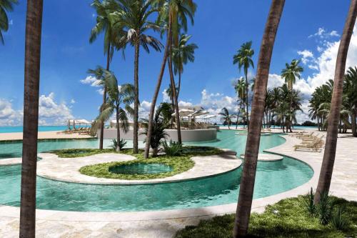 un complejo con palmeras y piscina en Viva Miches by Wyndham, a Trademark All Inclusive Resort, en Miches