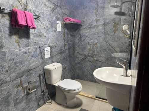 Koupelna v ubytování Conord Hotel