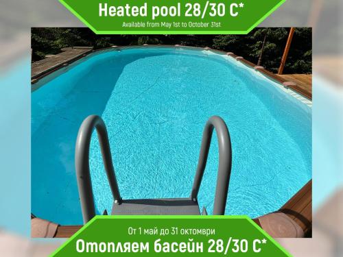a brochure for a heated pool c at Chalet Iskar Borovets in Borovets