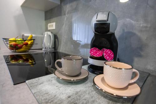 Příslušenství pro přípravu čaje a kávy v ubytování APARTMANI TEA