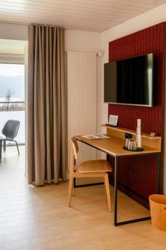 Boutique Hotel Balmにあるテレビまたはエンターテインメントセンター