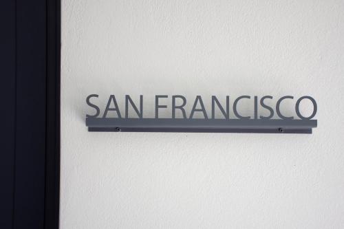 a sign that says san francisco on a wall at Kolymvari Hills in Chania Town