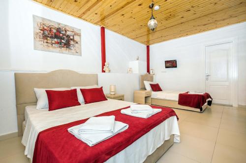 Postel nebo postele na pokoji v ubytování MERVE BUTİK OTEL