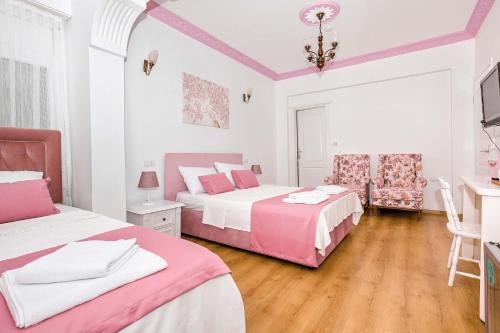 Postel nebo postele na pokoji v ubytování MERVE BUTİK OTEL