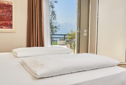 Postel nebo postele na pokoji v ubytování Agriturismo Maso Botes