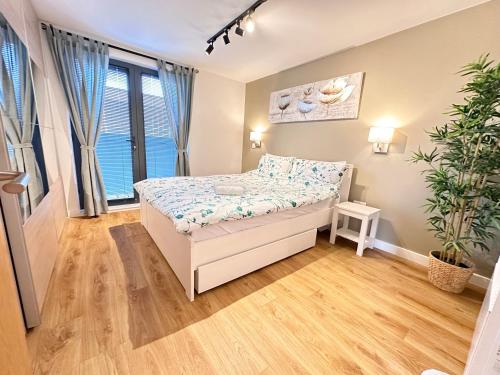 Ένα ή περισσότερα κρεβάτια σε δωμάτιο στο The Works - Two bed penthouse