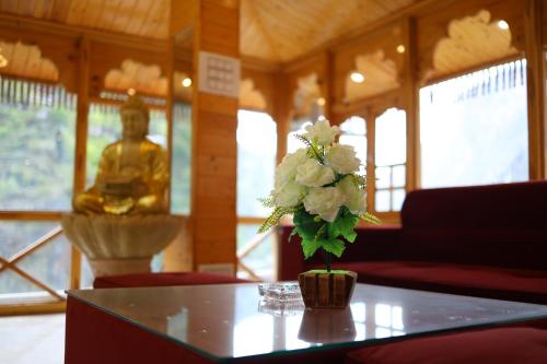 Posezení v ubytování Tirthan Village Resort - Tirthan Valley