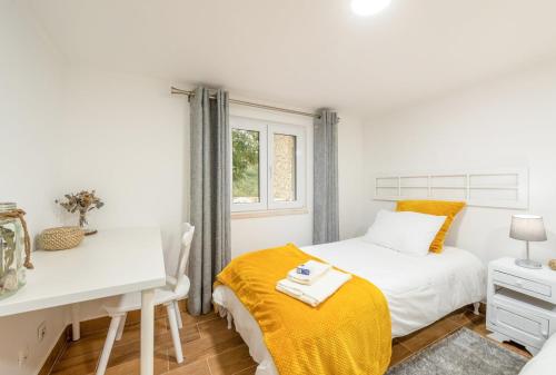 Llit o llits en una habitació de Countryside paradise in Bucelas