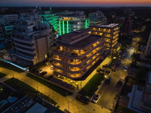 an overhead view of a city at night at Bellettini Hotel in Milano Marittima