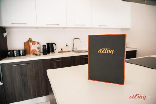 a sign on a counter in a kitchen at Mensija Valley Residences in St Julian's