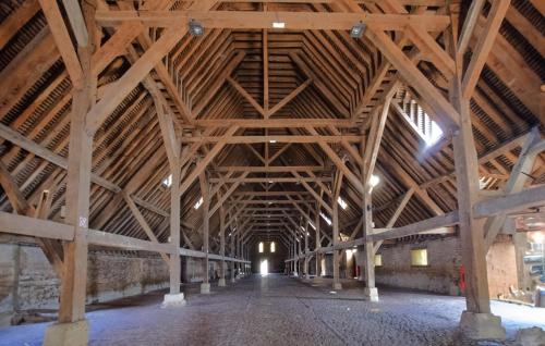 an empty barn with wooden ceilings and beams at Stunning Home In Stmarguerite Dloges in Sainte-Marguerite-des-Loges
