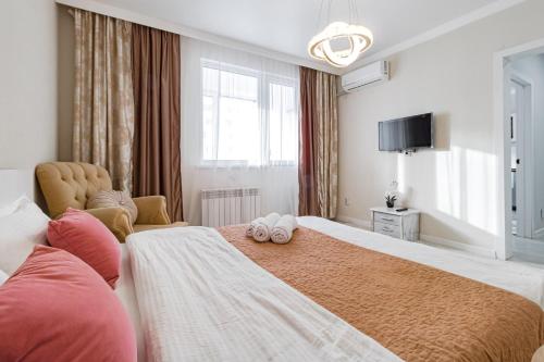 Llit o llits en una habitació de Туран 55к