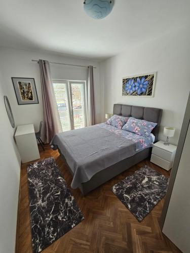 Posteľ alebo postele v izbe v ubytovaní Apartments Grgic