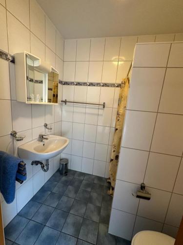 Ein Badezimmer in der Unterkunft AR LIVING Rüsselsheim