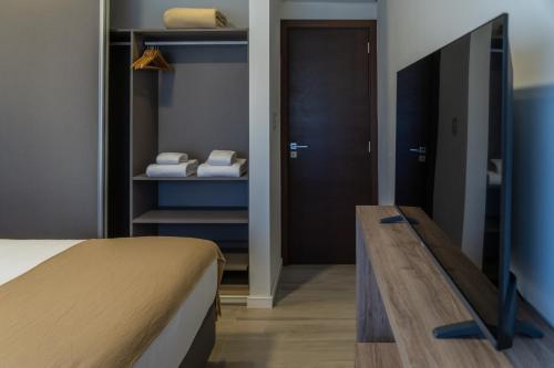 Postel nebo postele na pokoji v ubytování Espacio Terra Apartamentos