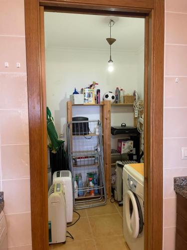 a laundry room with a washer and dryer at Cumbre Del Sol Segrelles 11 in Cumbre del Sol