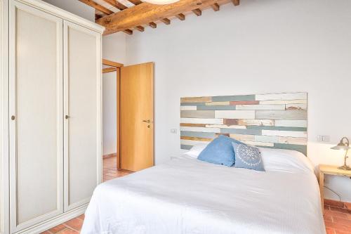 Ένα ή περισσότερα κρεβάτια σε δωμάτιο στο Appartamento - La Meridiana