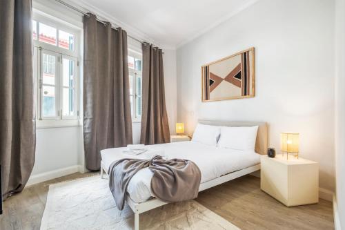 En eller flere senge i et værelse på Ponte Nova Studios