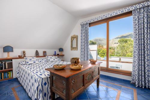 Giường trong phòng chung tại Mille e Una Notte By Domus Sicily