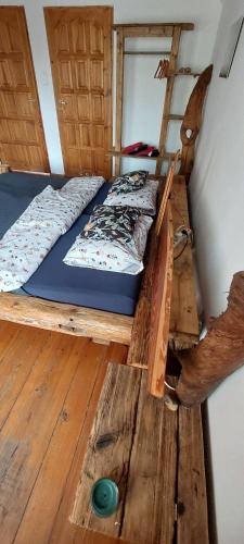 Postel nebo postele na pokoji v ubytování Dom na Mazurach Pilec