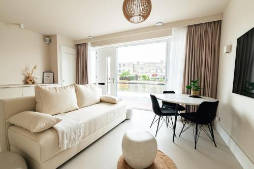 Posezení v ubytování Stads appartement